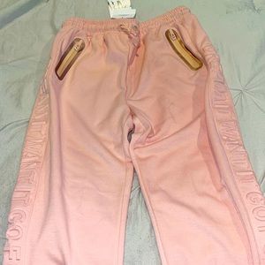 Girls pink long sweats from Zara size 13-14 , with pink zippers pockets